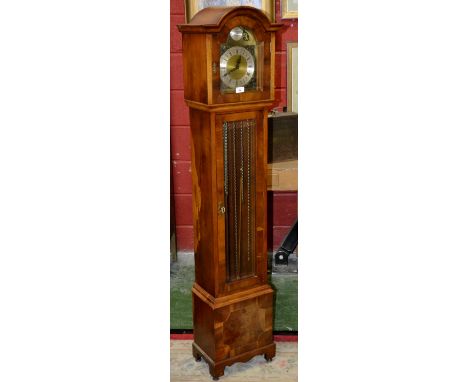 A mahogany veneered grandmother clock, FHS movement, arched dial, gilt spandrels, silvered chapter ring, Roman numerals with 