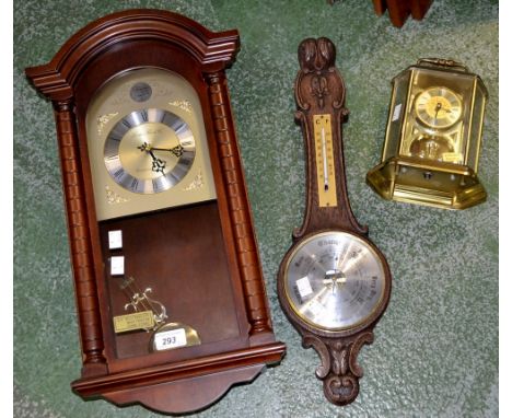 An aneroid barometer; a wall clock; a carriage clock (3)
