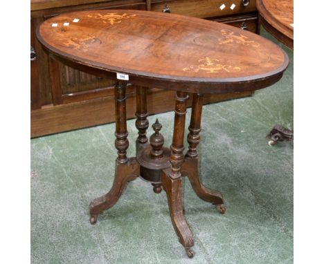 A Victorian inlaid walnut occasional table, quarter veneered oval top inlaid with satinwood urns and stringing, four turned s