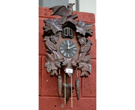 A modern cuckoo clock with battery powered movement.