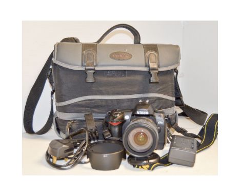 A Nikon D70s Digital Camera, with Nikkor AF-S 18-70mm f/3.5-4.5 lens in soft camera bag. 