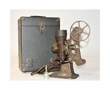 A Bell & Howell Filmo 8 Projector, model 122-B, in original case