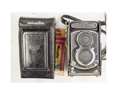 A Minolta Autocord RA TLR Camera, with Rokkor 75mm f/3.5 lens, shutter firing, body VG.