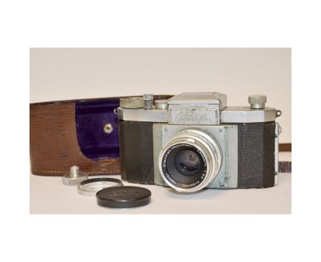 A Kamera Werkstatten Praktiflex SLR Camera,  first gen model, c.1939, chrome, waist level finder, shutter working, with a Ste