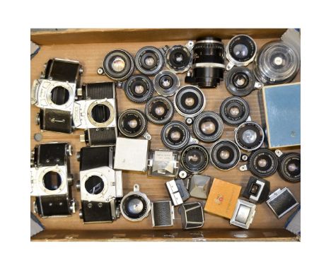 Exakta Camera Bodies, with a selection of Exacta fit lenses and viewfinders.