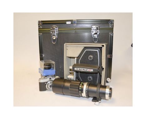 A Bell & Howell 627 16mm Cine Camera, with 20mm f/1.9 super comat lens in makers box, lot also includes two Rodagon enlarger 