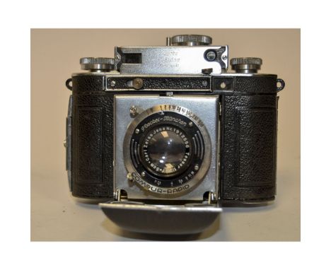 A Certo Dollina II Folding Camera,  chrome rangefinder housing version, shutter working, with Carl Zeiss Jena 5cm f/2.8 Tessa