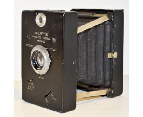 A Dallmeyer Snapshot Strut Folding Camera, 6x9cm exposures, with a f/6 anastigmat, body F, elements, G, some haze