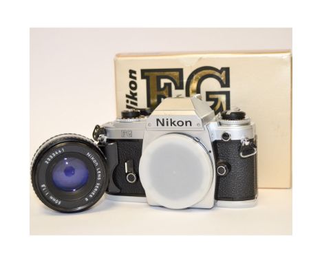 A Nikon FG SLR Camera,  chrome, serial no. 8645892, untested, body VG-E, in maker's box together with a 50mm f/1.8 Nikon Seri