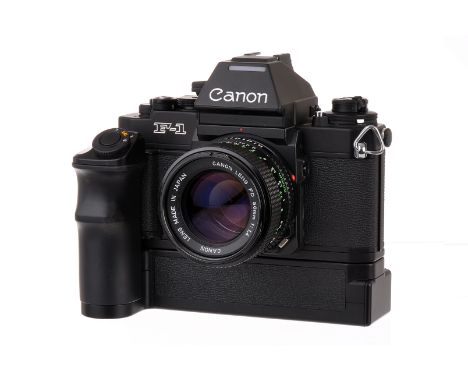 A Canon F-1n SLR Camera, black, serial no. 104053, with FD f/1.4 50mm lens, black, serial no. 1868496, body, VG-E, shutter no