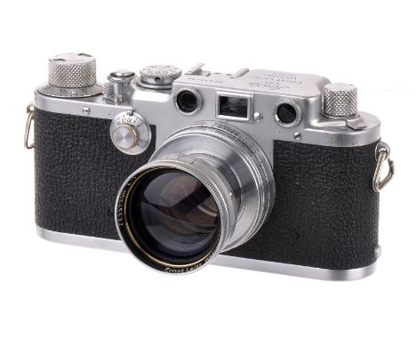 A Leica IIIf Black Dial Rangefinder Camera, 1950/51, chrome, serial no. 533196, with Leitz Summitar f/2 50mm ‘Radioactive’ le