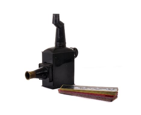 A Black-Painted Tinplate Magic Lantern, with chimney, complete with various slides, in wooden box