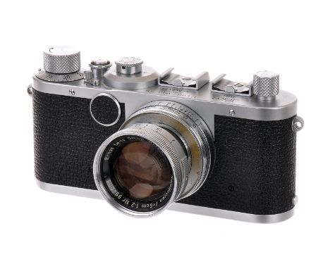 A Leica Ic Body, chrome, serial no. 560434, with Leitz Summicron f/2 50mm ‘Radioactive’ lens, chrome, serial no. 994008, body