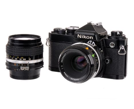 A Nikon FE SLR Camera, black, serial no.3365426, with Nikkor f/2 50mm lens, black, serial no. 3552657, body, shutter working,