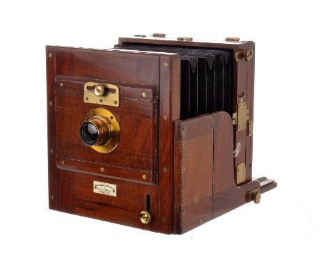 An A & N Auxiliary C.S. Ltd Mahogany Tailboard Camera, Army & Navy Co-Operative Society, 6.5”x4.5”, with Aldis Uno f/7.7 7.5”