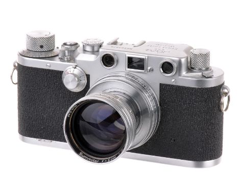 A Leica IIIc Rangefinder Camera, 1950, chrome, serial no. 503978, with Leitz Summitar f/2 50mm lens, 1949, chrome, serial no.