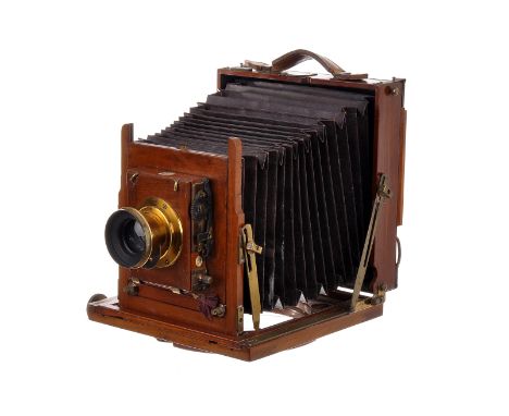 A Thornton Pickard Ruby Mahogany Field Camera, 6.5”x4.5”, serial no. 8114c, with Thornton Pickard Altrincham f/11 6½x4¾ rotar