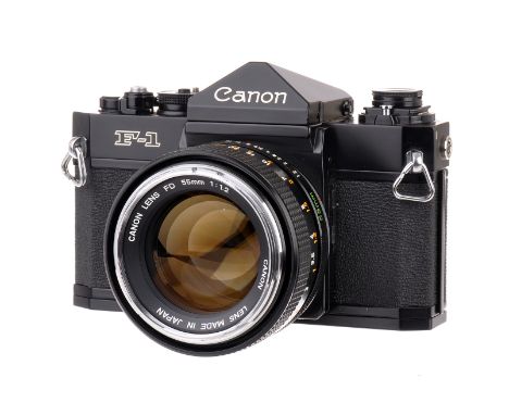 A Canon F-1 SLR Camera, black, serial no. 104163, with FD f/1.2 55mm lens, black, serial no. 11519, body, VG, shutter working