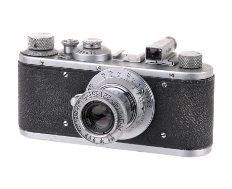 A Zorki Camera, Leica standard copy, chrome, serial no. 57096, with Industar-22 f/3.5 50mm lens, body, F-G, shutter working, 