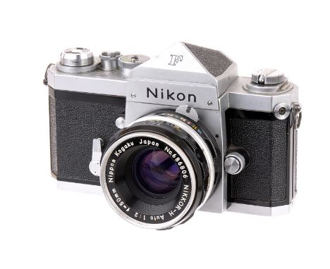 A Nikon F SLR Camera, chrome, serial no. 6561304, with Nikkor-H f/2 50mm lens, black, serial no. 686806, body, G, shutter wor