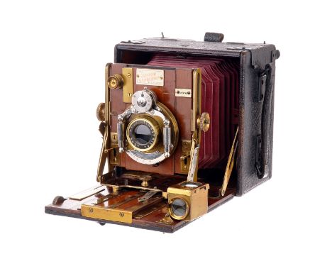 A Junior Sanderson Hand & Stand Camera, with Beck Symmetrical lens, body, VG, lens, G-VG, shutter working, slow speeds inaccu