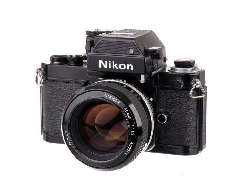 A Nikon F2SB SLR Camera, black, serial no. 7705329, with Nikkor AI f/1.2 55mm lens, black, serial no. 400064, body, G-VG, shu
