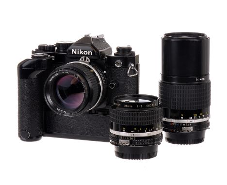 A Nikon FM2n SLR Camera, black, serial no. 7548179, with Nikkor AIS f/2 35mm lens, black, serial no. 280328, body, VG, shutte