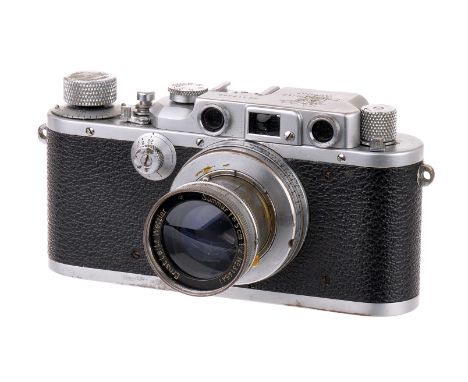 A Leica IIIb Rangefinder Camera, 1939, chrome, serial no. 319396, with Leitz Summar f/2 50mm lens, 1936, chrome, serial no. 3