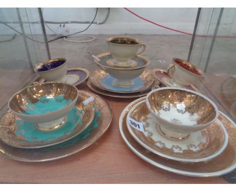 3 Heavily Gilded Trios and 2 Gilded Cups and saucers