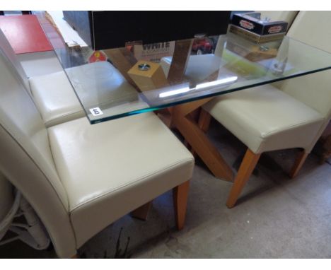 Modernist Glass topped square dining table on Light Oak cruciform base and a set of 4 Leather Dining chairs