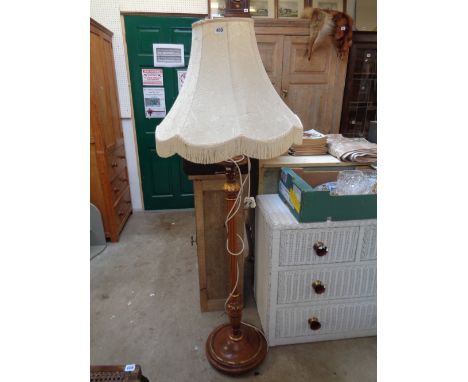 Good quality Walnut column standard lamp with gilded detail