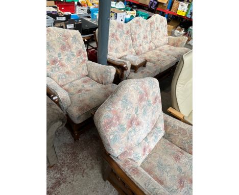 An Ercol 2 seater sofa and 2 matching armchairs.Good overall condition, some light general wear and signs of use.