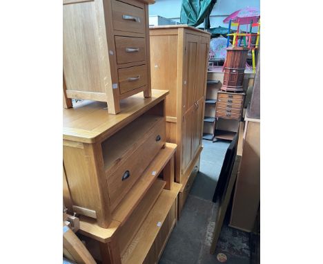 Various items of light oak furniture including wardrobe, blanket box, coffee table, TV stand, bedside drawers and dining tabl