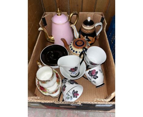 Three antique teapots including Prattware, Royal Albert 'Masquerade' teacups, and two pieces of Royal Albert 'Old Country Ros
