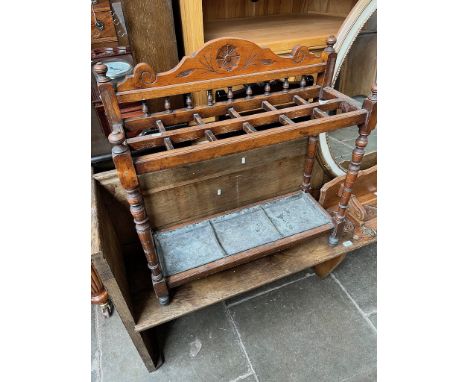A late Victorian mahogany stick stand with galvanised drip tray.Some general wear to include surface marks and scratches. The