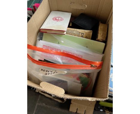 A box of mixed items apparently related to actress Patricia Routledge. These include props such as Hetty Wainthropp's busines