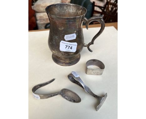 A silver napkin ring and silver plated goblet, spoon and pusher.  