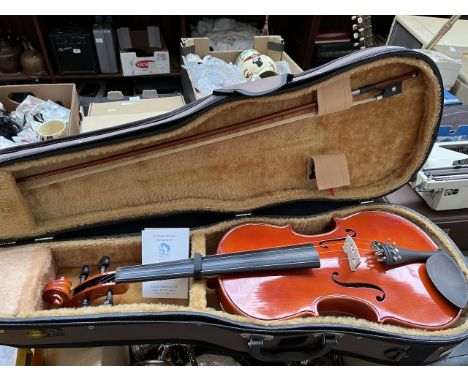 A Stentor Student II 16" viola, with ebony fingerboard and pegs, with teka pattern wood chin rest and bow with ebony frog and