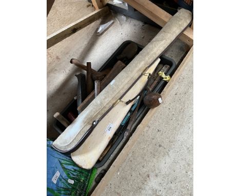 A box of tools, a cricket bat and a Viking snooker cue.  