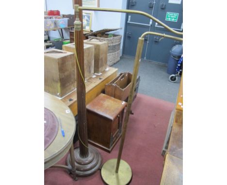 A XX Century Brass Standard Lamp, with a moveable arm, circular base, together with one other standard lamp, with a reeded ta