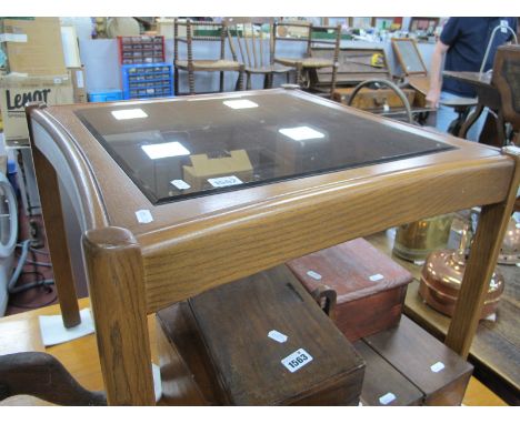 Ercol Coffee Table, with concave sides and black glass insert top, 59cm square.