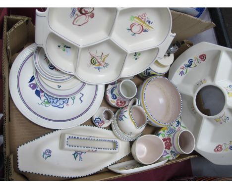 Poole Pottery Hors d'oeurve Platters, lamp, bowl, butter dish, vases, jug, plates, all with stylized floral decoration, (21).