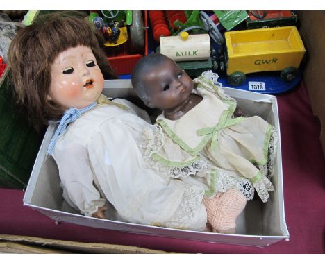 Armand Marseille Black Baby Doll. 341/2.k 25.5cm high, larger white doll.