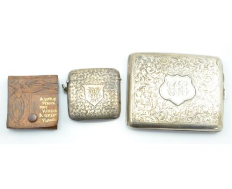 SMITH & BARTLAM; an Edward VII hallmarked silver vesta case of square curved form, overall engraved with foliate motifs, cent