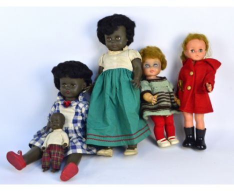 Two 1960/70s black 'Friedo' dolls, both with black wigs, open/close yellow/brown glass eyes, painted features and closed mout