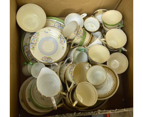 A Phoenix 'Viola' part tea set, comprising nine cups, twelve saucers, six side plates, sandwich plate, sugar bowl, milk jug, 