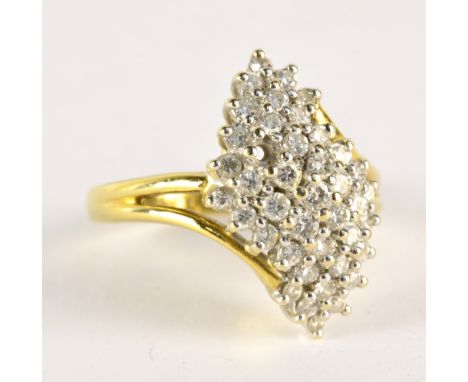 An 18ct yellow gold and diamond dress ring, the melee diamonds set in a domed lozenge, one stone missing, size L, approx 6.3g