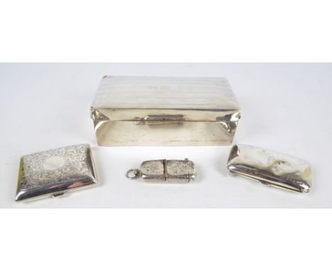 WILLIAM HENRY SPARROW; a George V hallmarked rectangular cigarette case overall engraved with foliate scrolls and with vacant