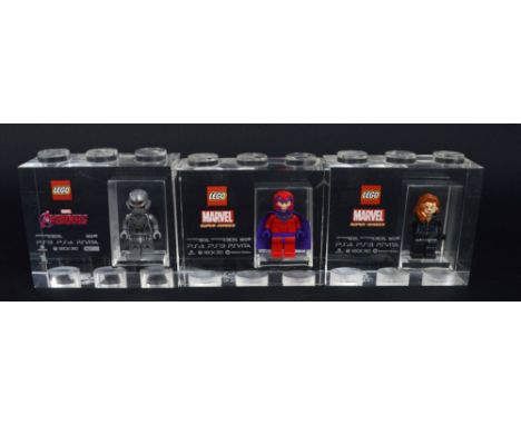 Three Lego for TT Games Minifigure acrylic trophy bricks, Black Widow and Magneto from the Marvel Super Hero game, both issue