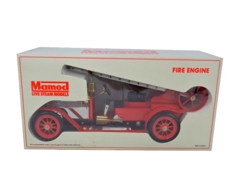 A boxed Mamod Fire Engine FE1 in red and chromed livery, with instruction leaflet, fuel tray, filler funnel and lubrication o